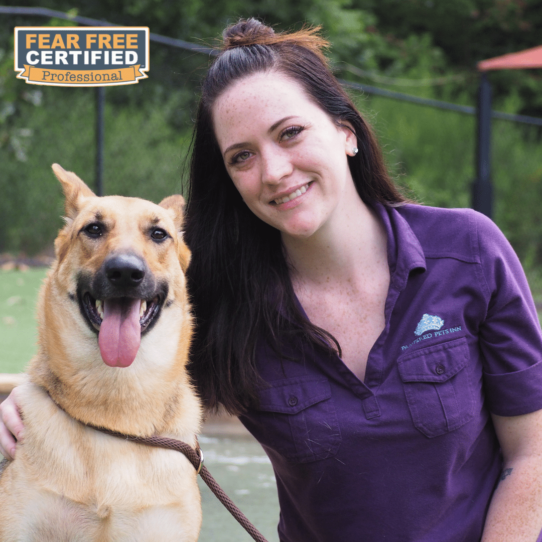 Office manager posing with her dog